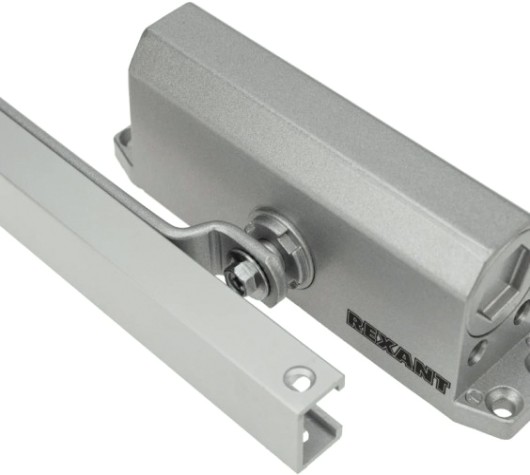 Доводчик дверной REXANT 46-0511 со скользящей тягой для дверей до 65 кг Доводчик дверной REXANT 46-0511 со скользящей тягой для дверей до 65 кг