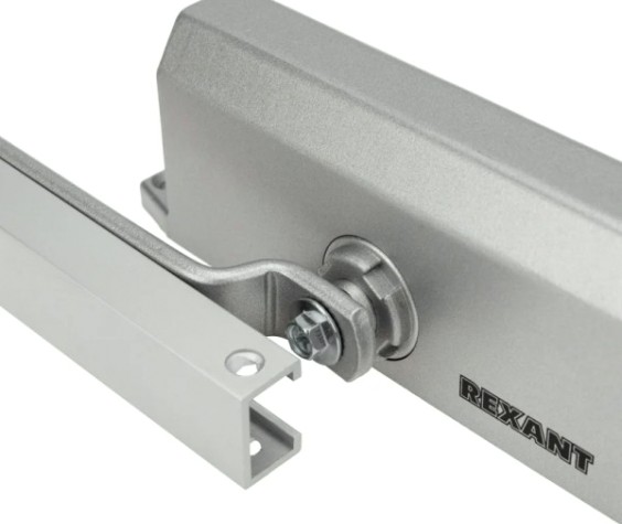 Доводчик дверной REXANT 46-0512 со скользящей тягой для дверей до 85 кг Доводчик дверной REXANT 46-0512 со скользящей тягой для дверей до 85 кг